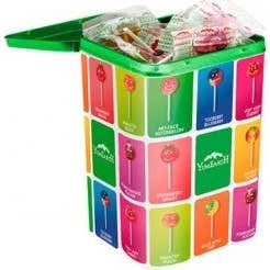 Yum Earth lata surtido de piruletas 8 sabores 50 uds